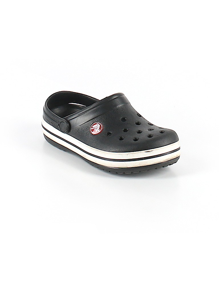 white crocs with black stripe