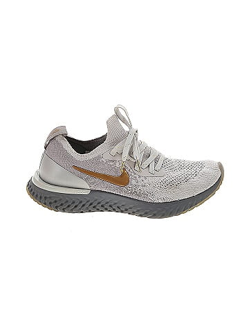 Nike epic react flyknit vast grey metallic hotsell gold (w)