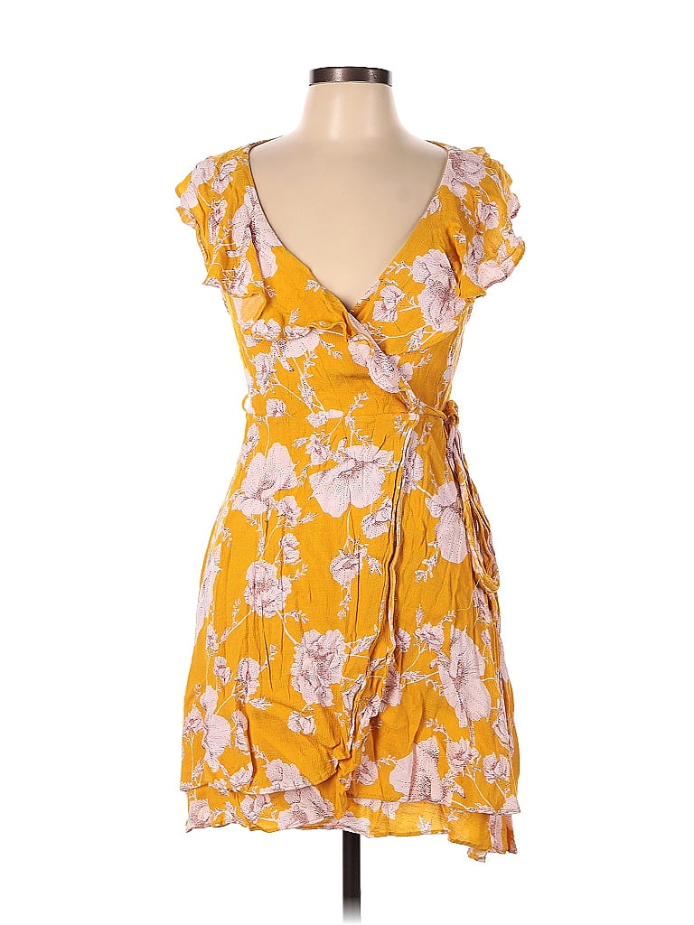 Free People Floral Yellow Casual Dress Size L - 65% off | ThredUp