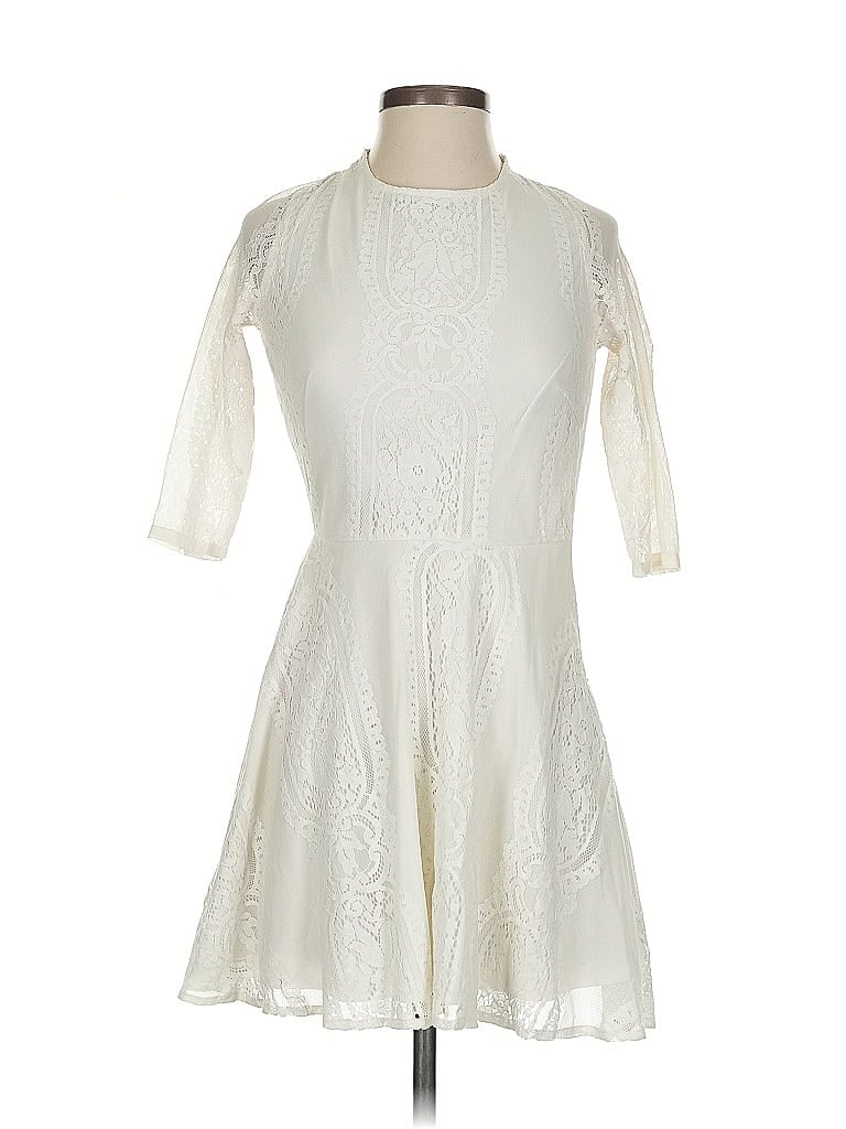Click to view more detailed imagery on our partner's website Pre-owned Lucy Paris Cocktail Dress In White