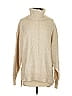 Beige turtleneck sweater with relaxed fit
