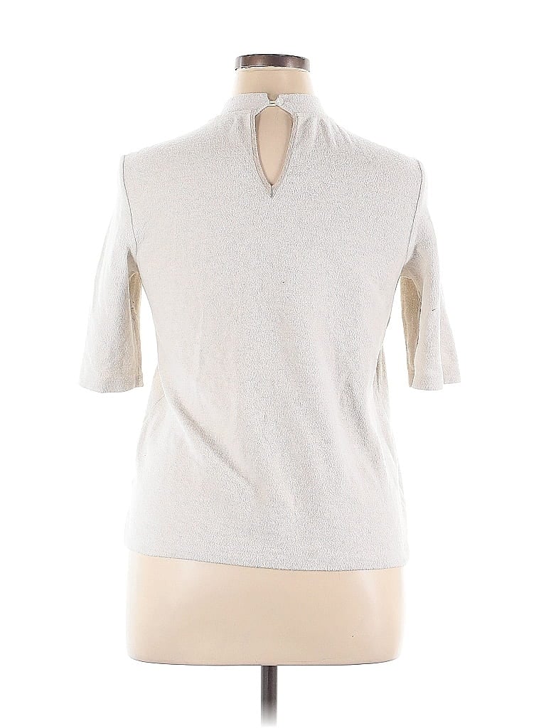Click to view more detailed imagery on our partner's website Pre-owned Amour Vert Short Sleeve Top Ivory Mock Neckline Tops In White
