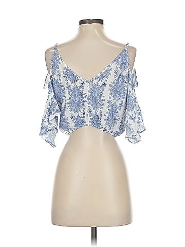 A. Peach Sleeveless Blouse (view 2)