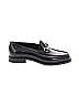 Black leather loafers with a polished finish