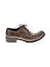 Brown leather oxford shoes