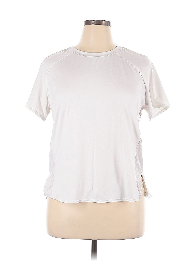 Click to view more detailed imagery on our partner's website Pre-owned Zella Short Sleeve Top White Mock Neckline Tops