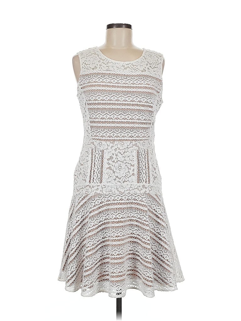 Click to view more detailed imagery on our partner's website Pre-owned Bcbgmaxazria Cocktail Dress In White