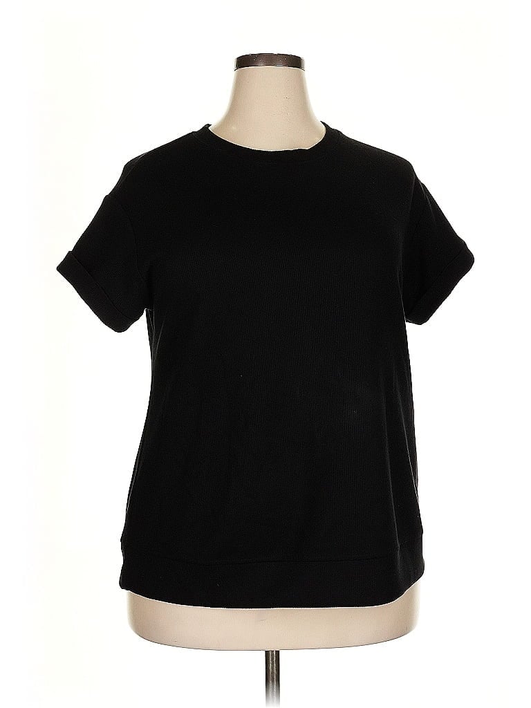 Click to view more detailed imagery on our partner's website Pre-owned Livi Short Sleeve Top Black Crew Neck Tops
