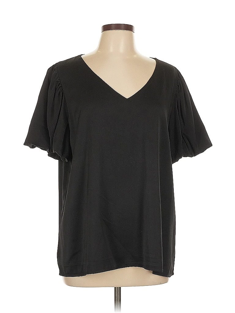 Click to view more detailed imagery on our partner's website Pre-owned Eesome Short Sleeve Top Black V Neck Tops