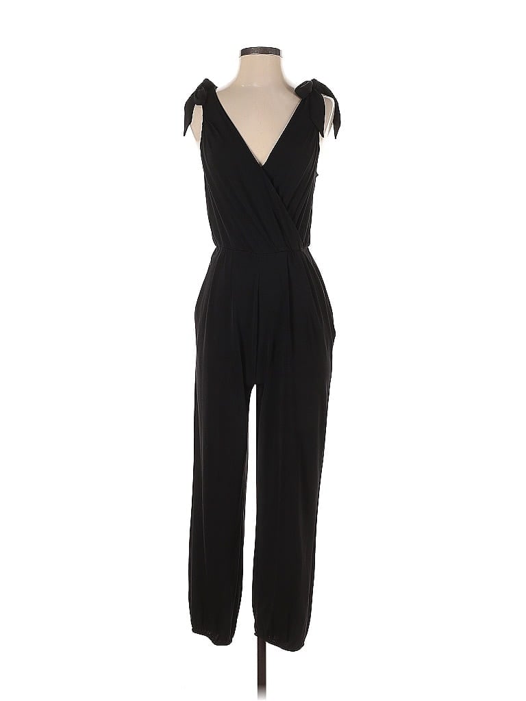 Pre-owned Bcbgeneration Jumpsuit In Black