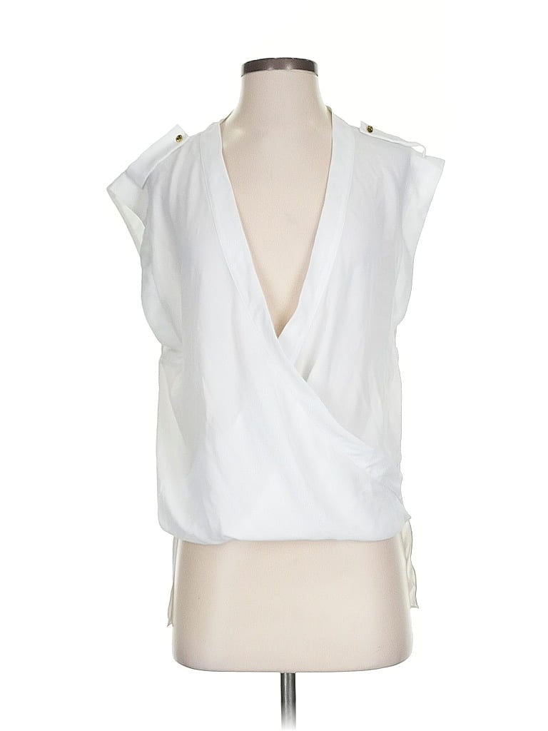 Click to view more detailed imagery on our partner's website Pre-owned Vince Camuto Sleeveless Blouse In White