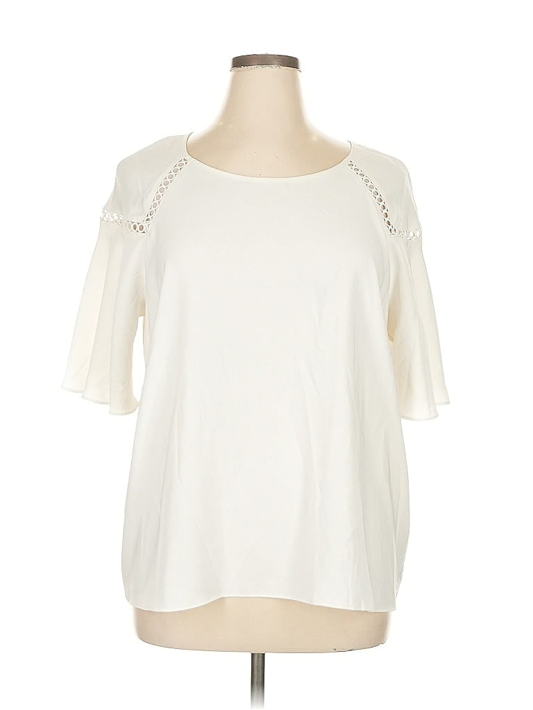 Click to view more detailed imagery on our partner's website Pre-owned Vince Camuto Short Sleeve Top Ivory Cold Shoulder Neckline Tops In White