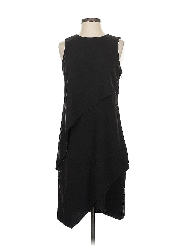 Click to view more detailed imagery on our partner's website Pre-owned Halston Heritage Cocktail Dress In Black