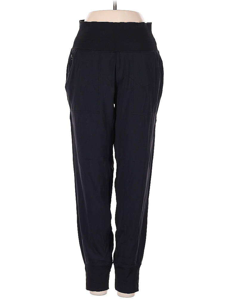 Click to view more detailed imagery on our partner's website Pre-owned Athleta Track Pants In Black