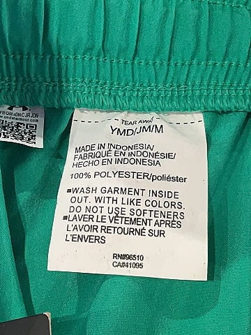 Under Armour 100% Polyester Green Athletic Shorts Size M (youth)