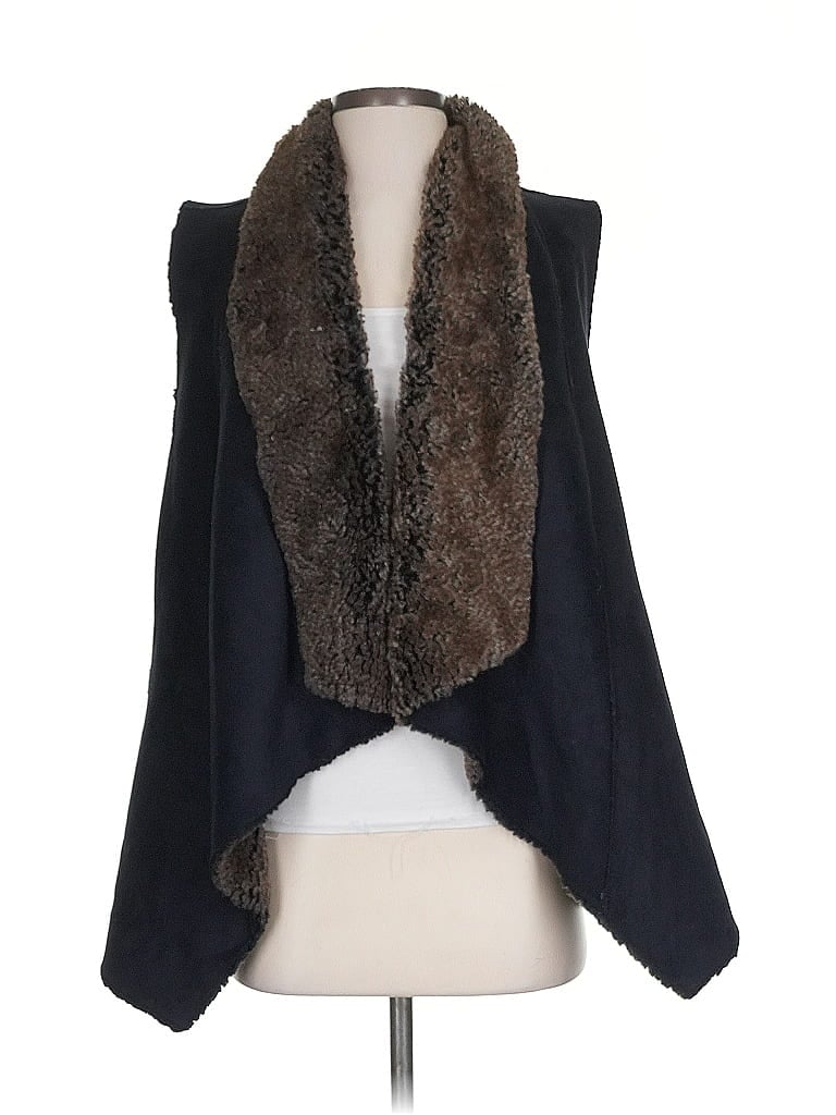 Click to view more detailed imagery on our partner's website Pre-owned Aqua Faux Fur Vest In Black