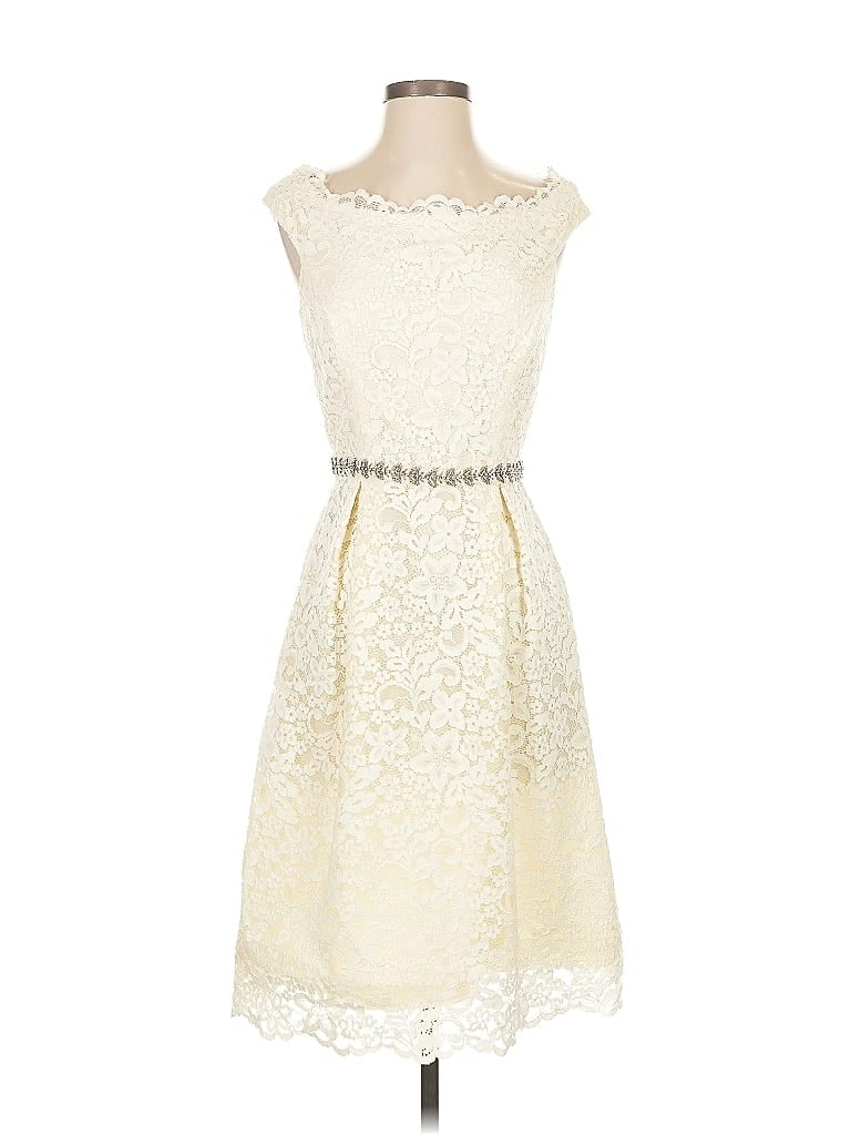 Click to view more detailed imagery on our partner's website Pre-owned Teri Jon Cocktail Dress In White