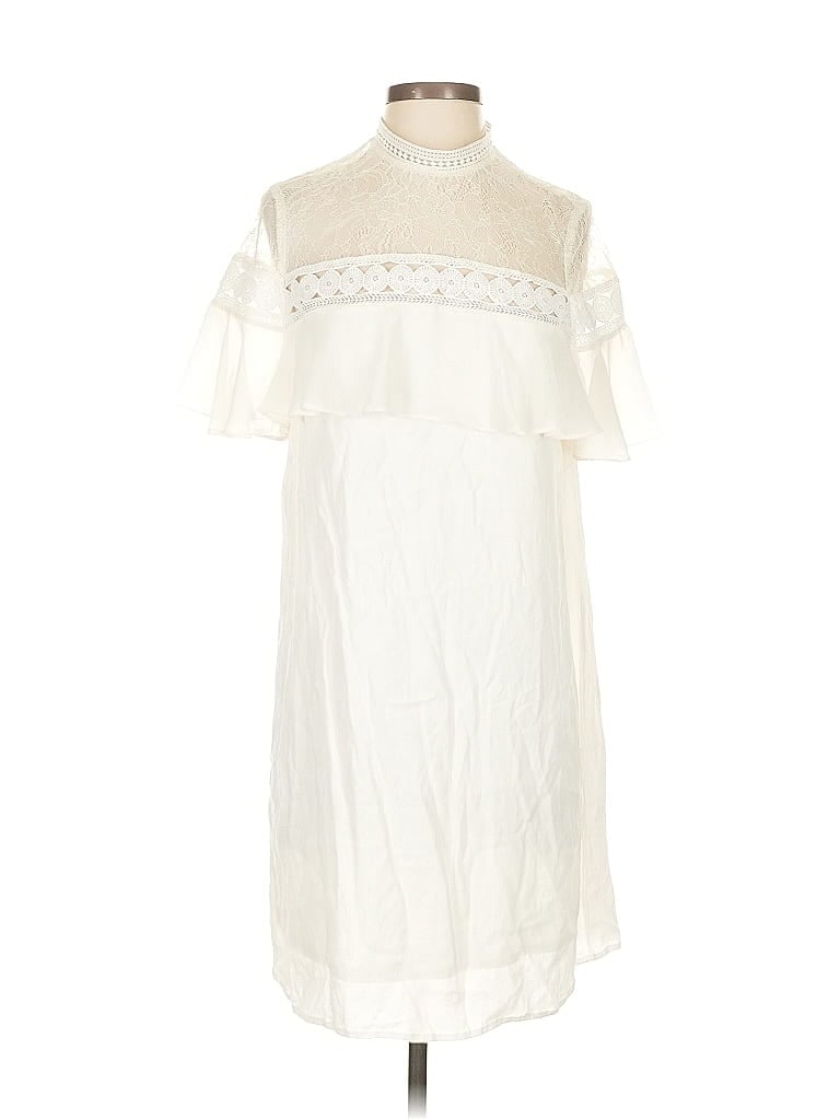 Click to view more detailed imagery on our partner's website Pre-owned Express Casual Dress In White