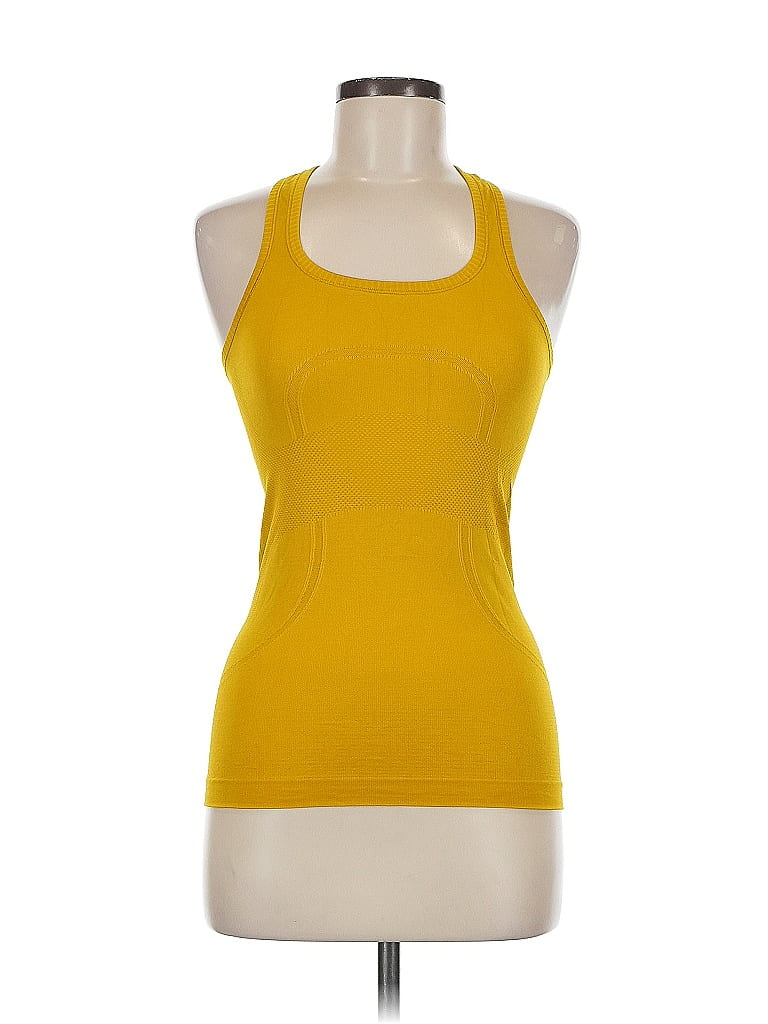 Click to view more detailed imagery on our partner's website Pre-owned Lululemon Athletica Tank Top Yellow Halter Neckline Tops