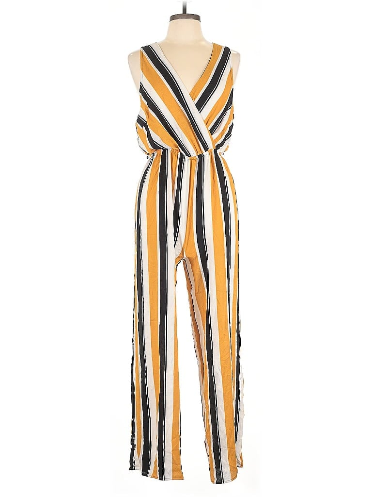Click to view more detailed imagery on our partner's website Pre-owned Almost Famous Jumpsuit In Yellow