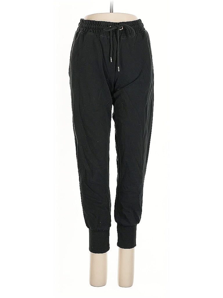 Click to view more detailed imagery on our partner's website Pre-owned Cotton On Track Pants In Black