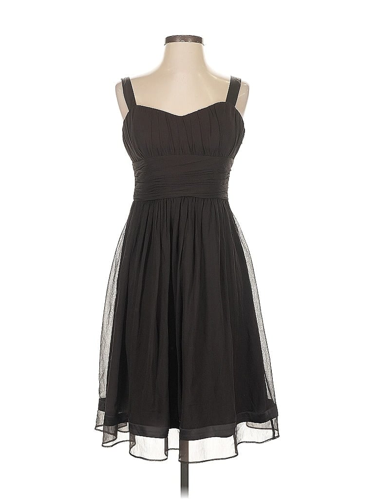 Click to view more detailed imagery on our partner's website Pre-owned Tahari Cocktail Dress In Black
