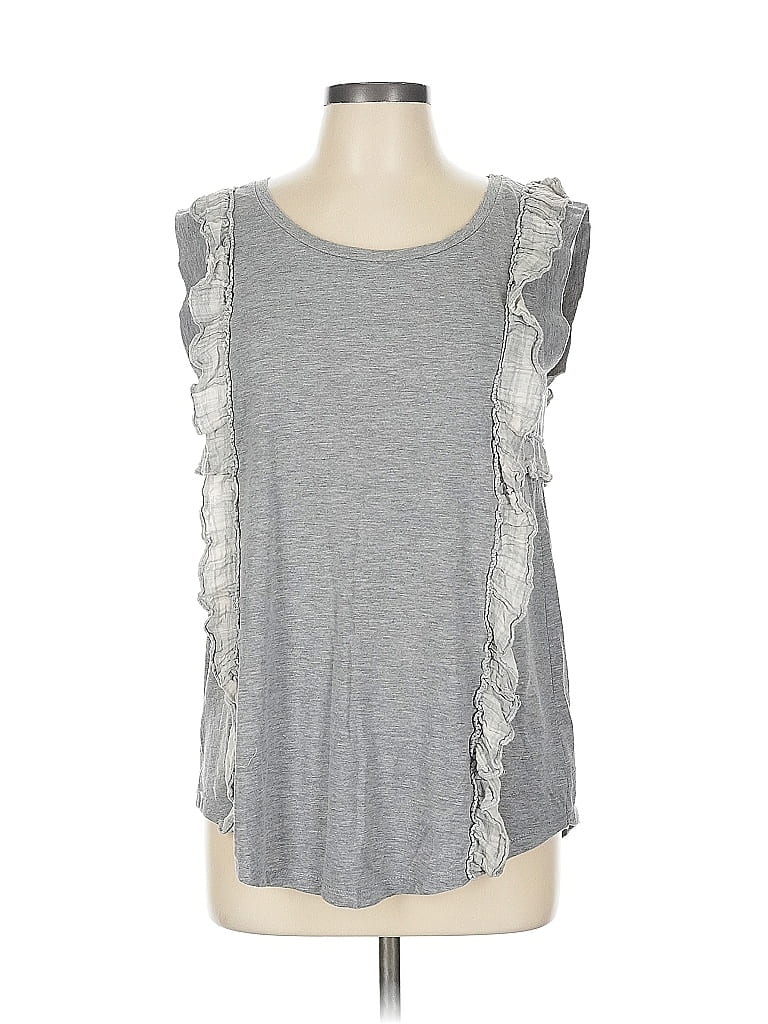 Click to view more detailed imagery on our partner's website Pre-owned Koché Short Sleeve Top Silver Ruffles Neckline Tops
