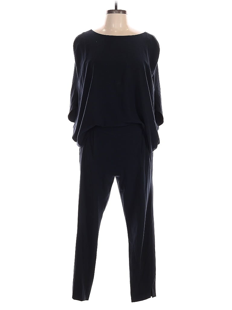 Click to view more detailed imagery on our partner's website Pre-owned Halston Jumpsuit In Black