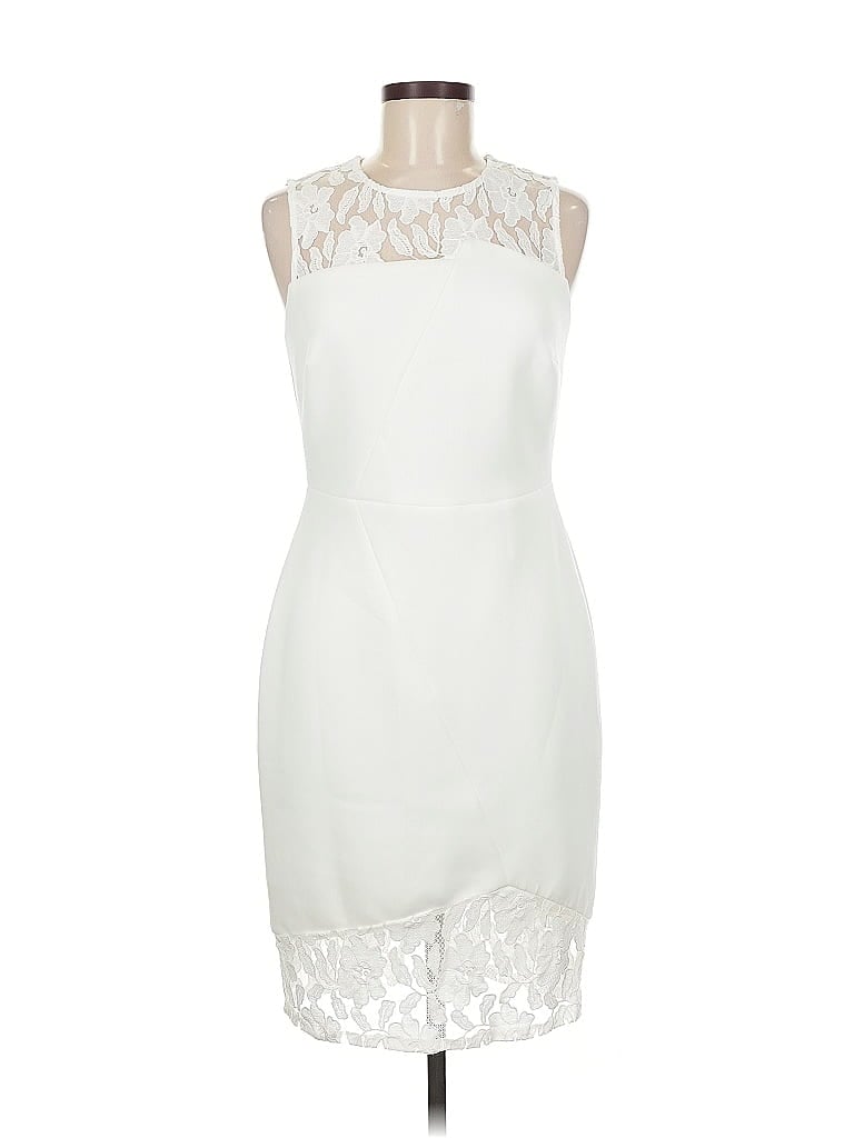 Click to view more detailed imagery on our partner's website Pre-owned Calvin Klein Cocktail Dress In White