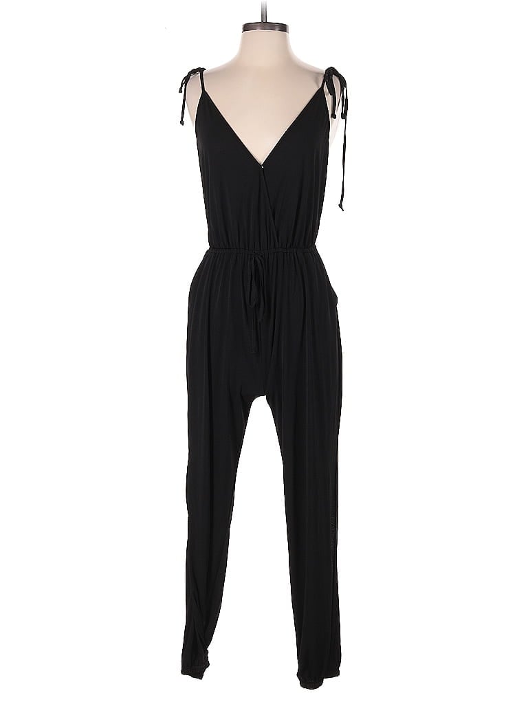 Pre-owned Bcbgeneration Jumpsuit In Black