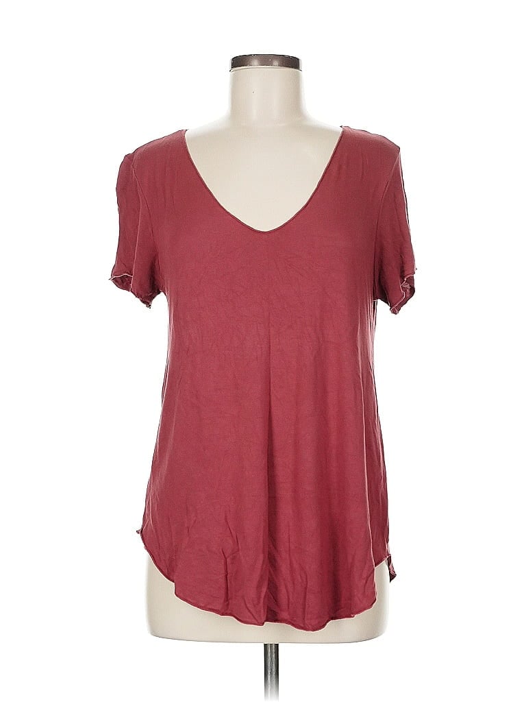 Click to view more detailed imagery on our partner's website Pre-owned Mod Ref Short Sleeve Top Pink V Neck Tops