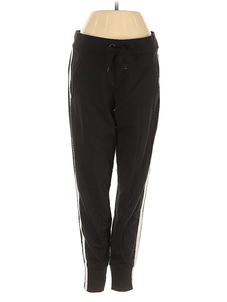 Click to view more detailed imagery on our partner's website Pre-owned Athleta Track Pants In Black