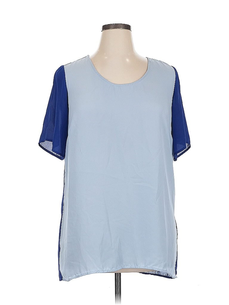 Click to view more detailed imagery on our partner's website Pre-owned Landa Curve By Dora Landa Short Sleeve Blouse In Blue
