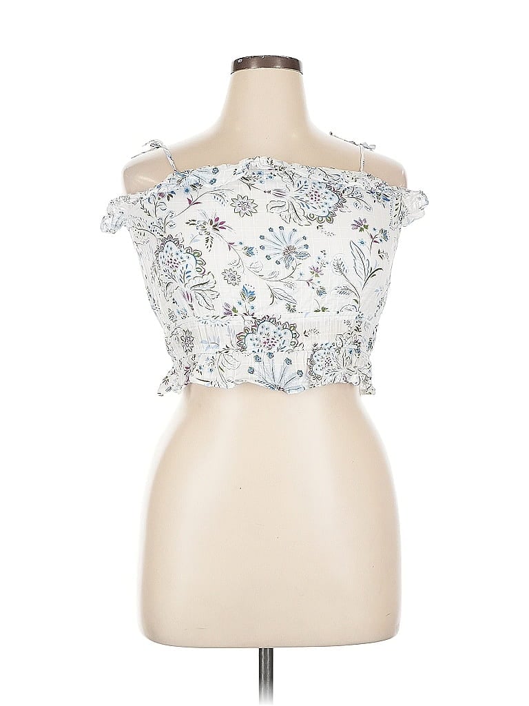 Click to view more detailed imagery on our partner's website Pre-owned Aqua Sleeveless Blouse In White