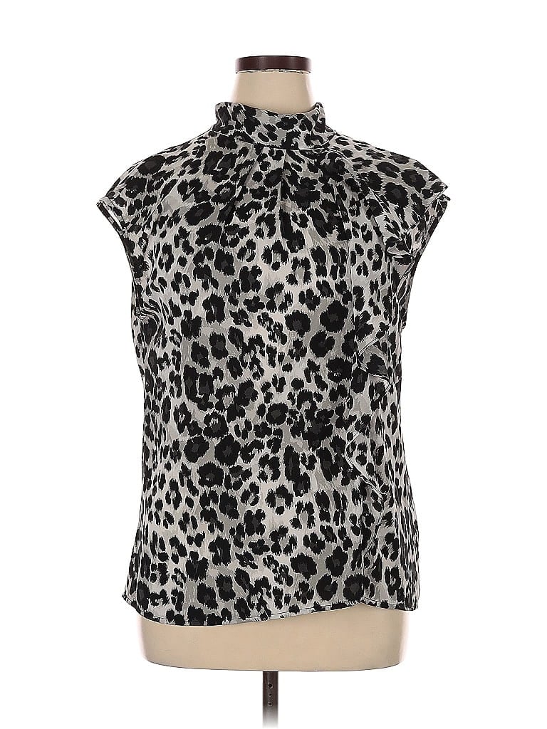 Click to view more detailed imagery on our partner's website Pre-owned New York And Company Sleeveless Blouse In Silver