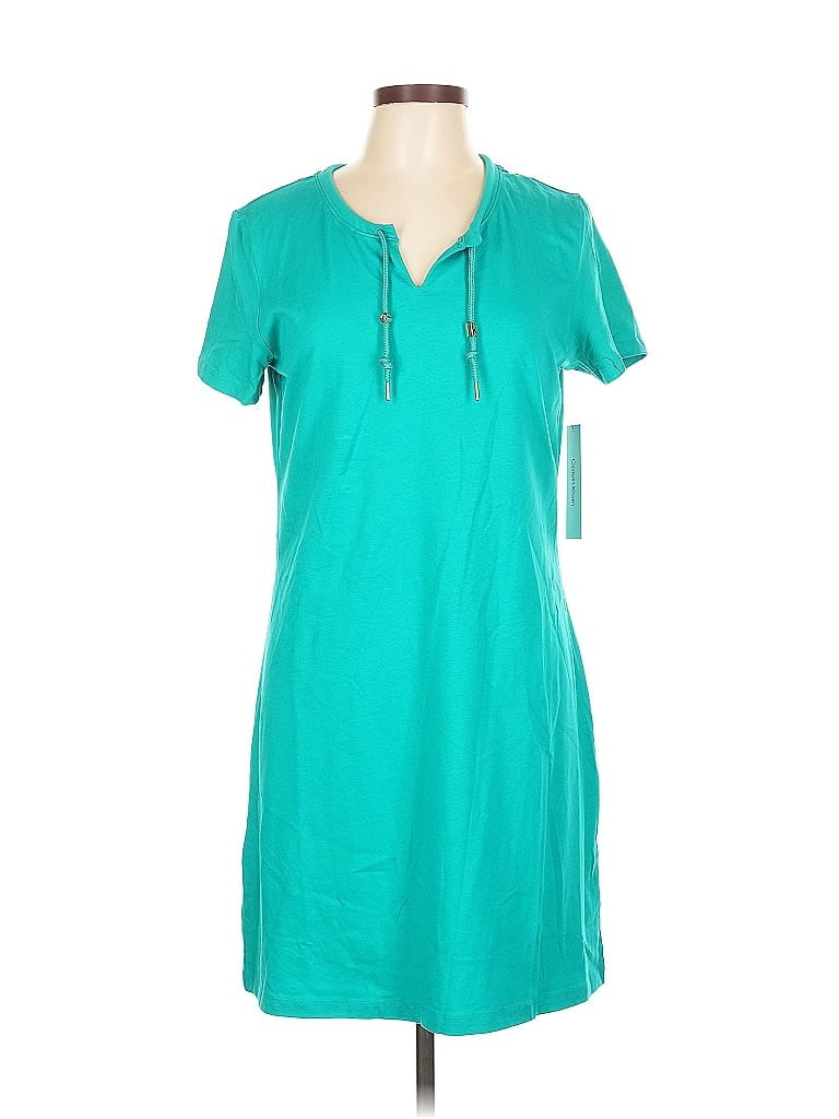 Click to view more detailed imagery on our partner's website Pre-owned Calvin Klein Short Sleeve Top Teal Keyhole Neckline Tops In Blue