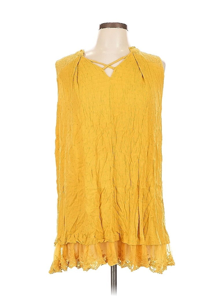 Click to view more detailed imagery on our partner's website Pre-owned Umgee Sleeveless Blouse In Yellow