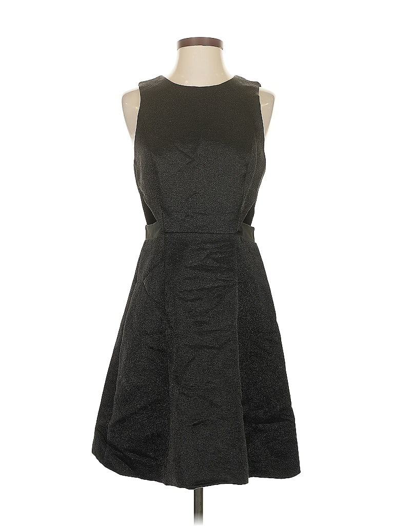 Click to view more detailed imagery on our partner's website Pre-owned Halston Heritage Cocktail Dress In Black