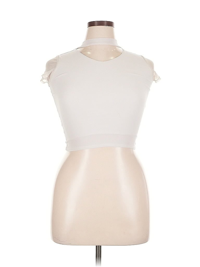 Click to view more detailed imagery on our partner's website Pre-owned Un Deux Trois Short Sleeve Turtleneck In White