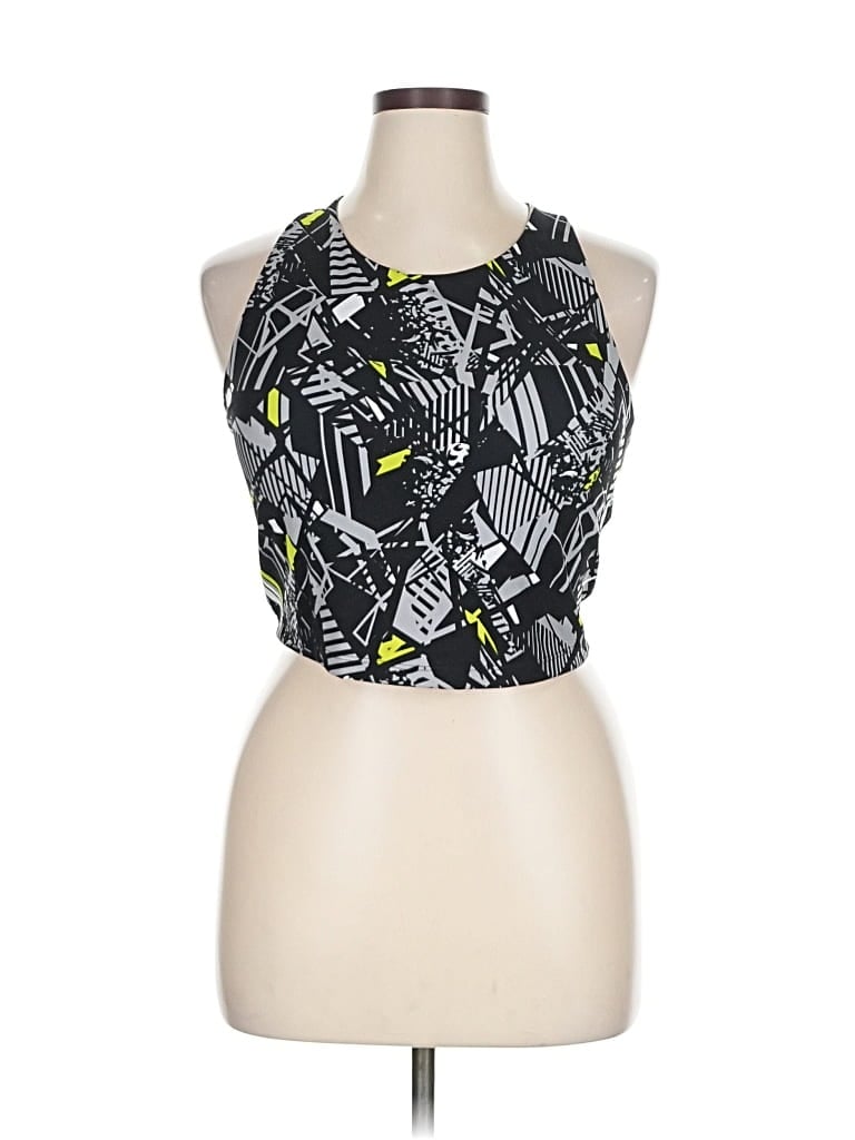 Click to view more detailed imagery on our partner's website Pre-owned Reebok Tank Top Black Halter Neckline Tops