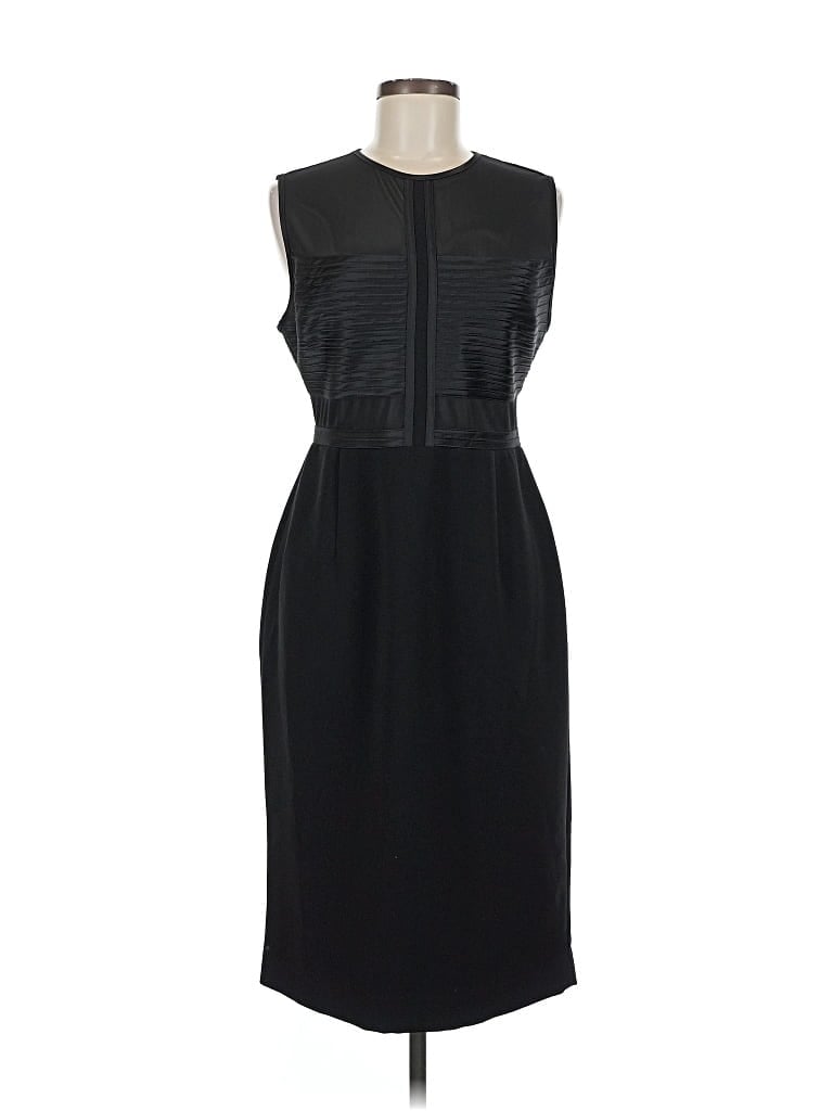 Click to view more detailed imagery on our partner's website Pre-owned Halston Heritage Cocktail Dress In Black