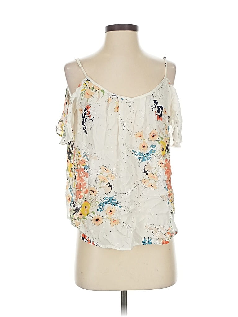 Click to view more detailed imagery on our partner's website Pre-owned Joie Sleeveless Silk Top Ivory Cold Shoulder Neckline Tops In White