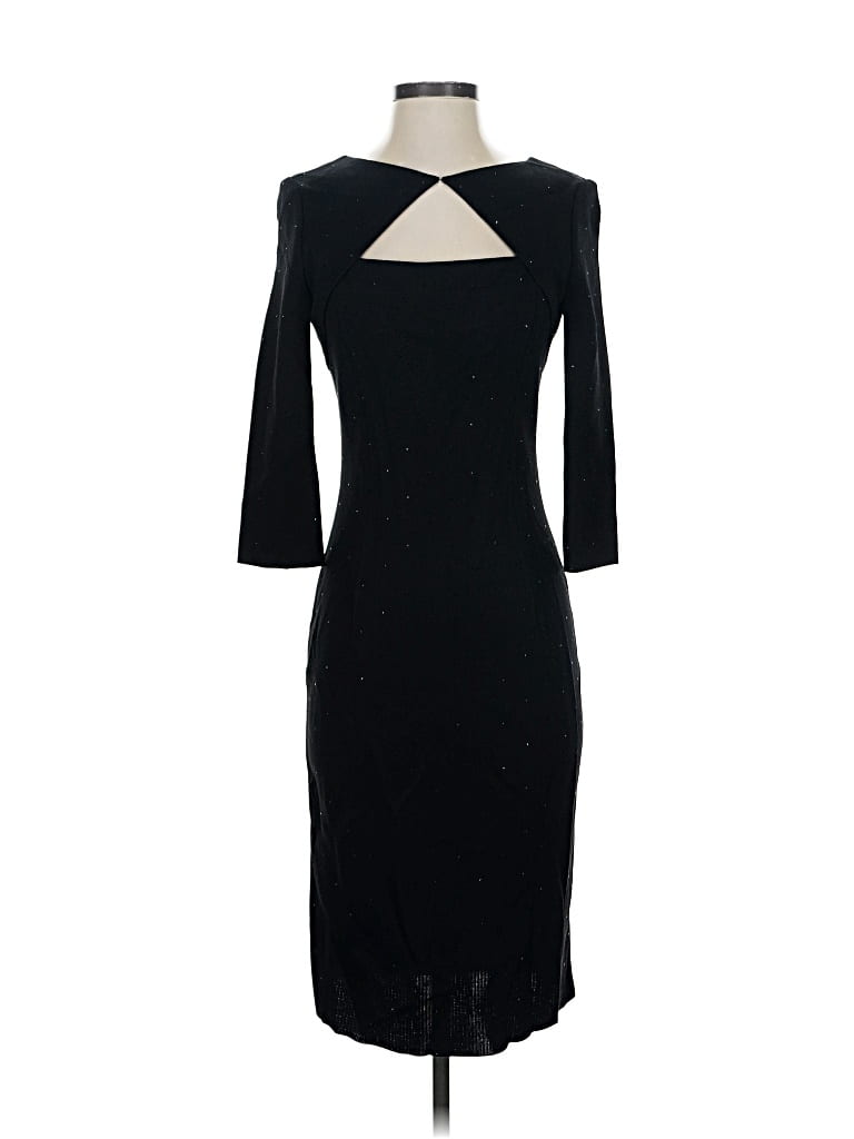 Click to view more detailed imagery on our partner's website Pre-owned St John Cocktail Dress In Black