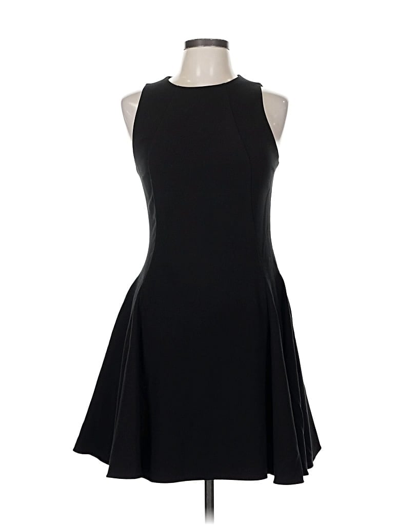 Click to view more detailed imagery on our partner's website Pre-owned Halston Heritage Cocktail Dress In Black