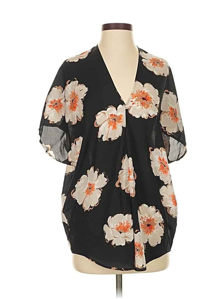 Click to view more detailed imagery on our partner's website Pre-owned Ivanka Trump Short Sleeve Blouse In Black