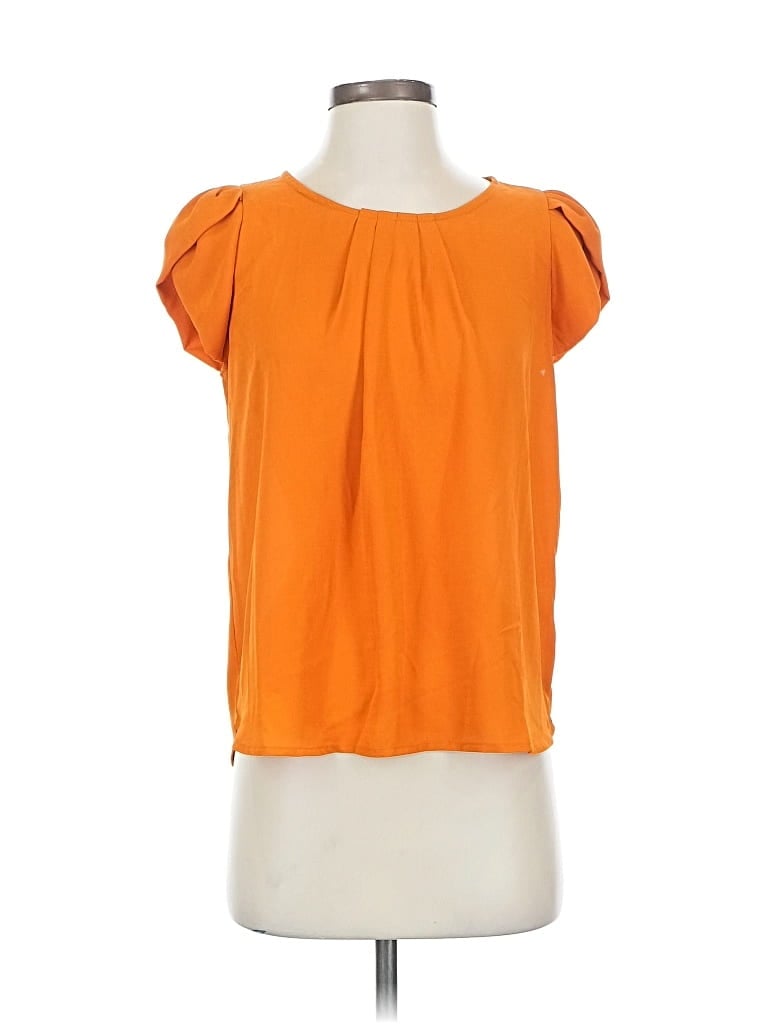 Click to view more detailed imagery on our partner's website Pre-owned Haute Monde Short Sleeve Blouse In Orange