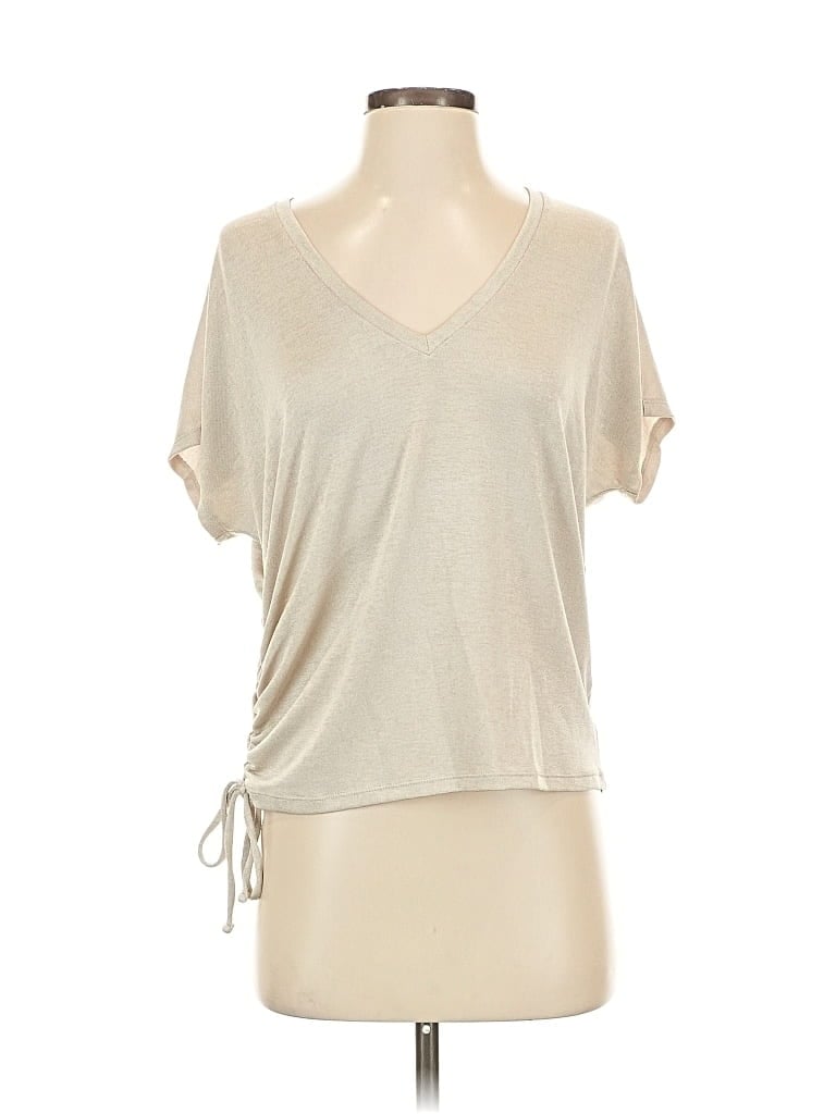 Click to view more detailed imagery on our partner's website Pre-owned Express Short Sleeve Top Ivory V Neck Tops In White