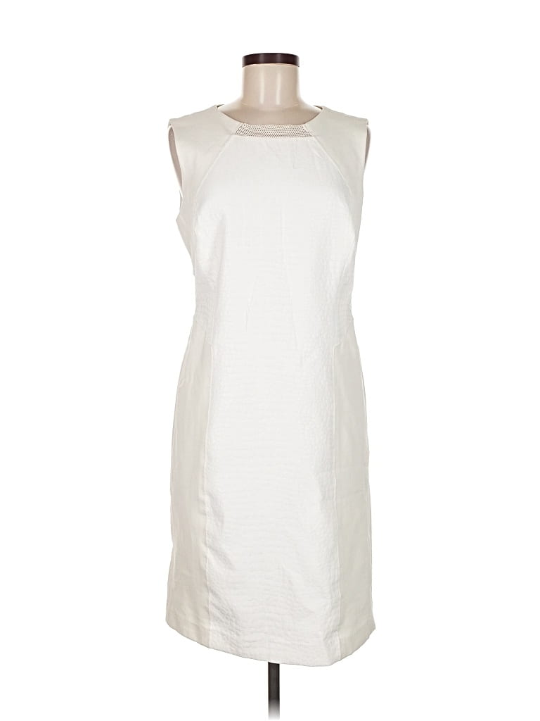 Click to view more detailed imagery on our partner's website Pre-owned Carmen Marc Valvo Casual Dress In White