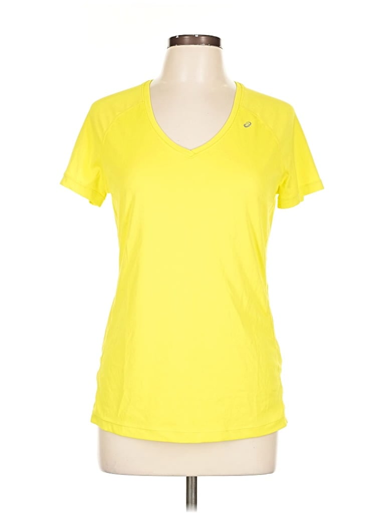 Click to view more detailed imagery on our partner's website Pre-owned Asics Short Sleeve Top Yellow V-neck Tops