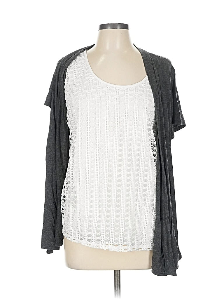 Click to view more detailed imagery on our partner's website Pre-owned Naif Short Sleeve Top Gray Square Neckline Tops